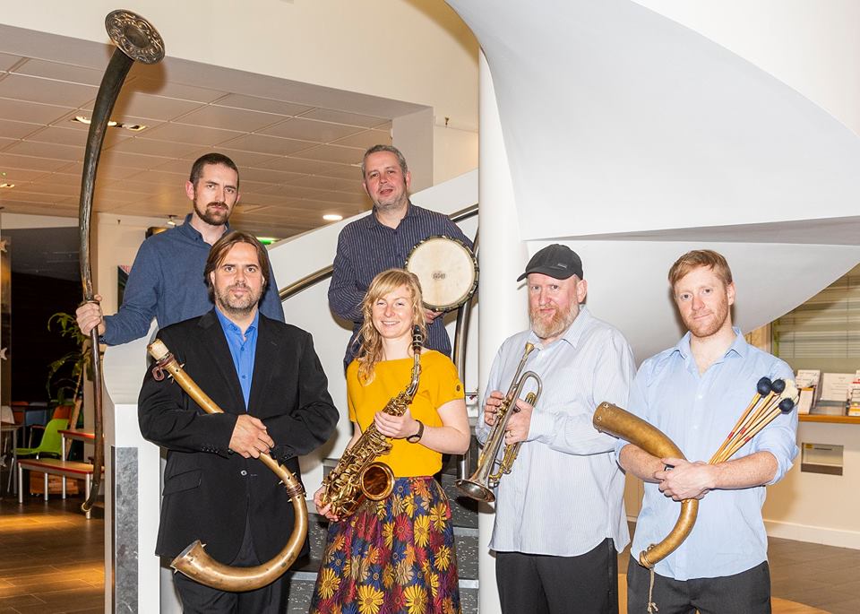 Photo of THE HORN & PERCUSSION SECTION OF THE IRISH MEMORY ORCHESTRA. Photo: John O'Neill